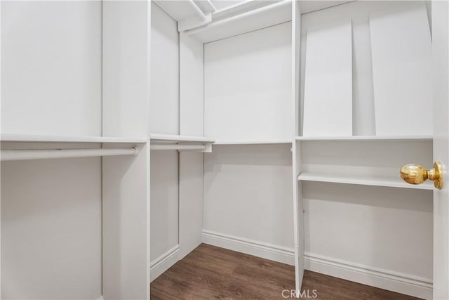 34 Carmel Ct, Laguna Beach, CA 92651 - spacious closet featuring wood finished floors