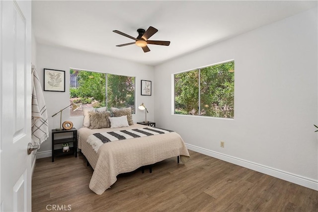 34 Carmel Ct, Laguna Beach, CA 92651 - bedroom featuring wood finished floors and a ceiling fan