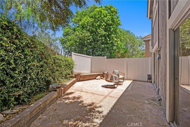 34 Carmel Ct, Laguna Beach, CA 92651 - fenced backyard with a patio area