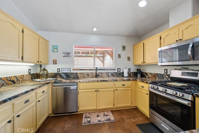 935 Running Stag Way, Paso Robles, CA 93446 - kitchen with appliances with stainless steel finishes, dark stone counters, cream cabinetry, and recessed lighting