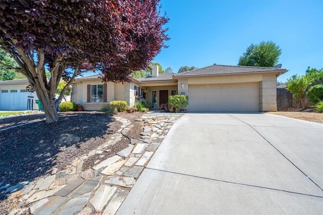 935 Running Stag Way, Paso Robles, CA 93446 - single story home with a garage, driveway, stucco siding, and a chimney