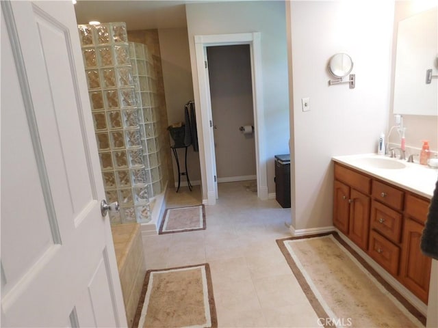 620 N La Sena Ave, West Covina, CA 91790 - full bath with vanity, a walk in shower, and tile patterned flooring