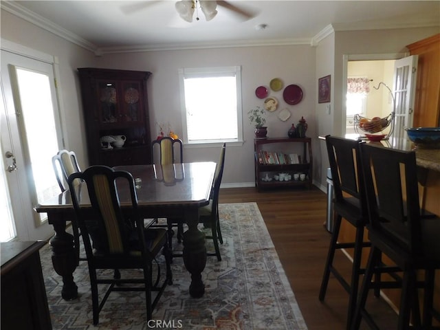 620 N La Sena Ave, West Covina, CA 91790 - dining area featuring a ceiling fan, crown molding, and dark wood-type flooring