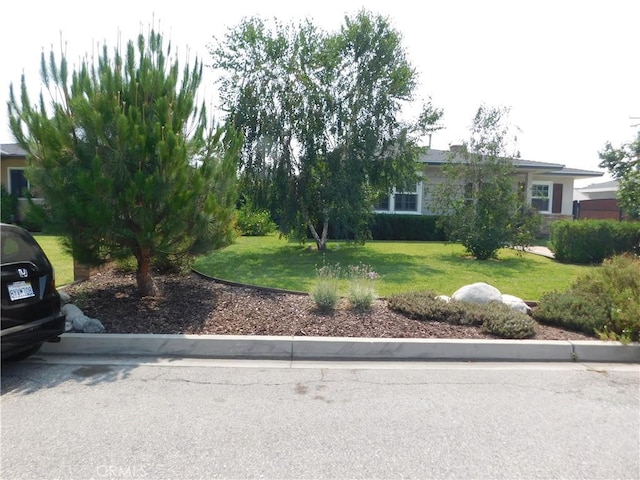 620 N La Sena Ave, West Covina, CA 91790 - view of front of house featuring a front lawn