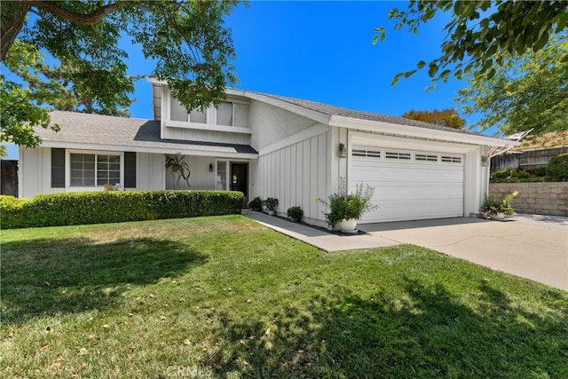 42244 Cosmic Dr, Temecula, CA 92592 - view of front facade featuring board and batten siding, a garage, concrete driveway, a front lawn, and roof with shingles