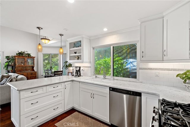 42244 Cosmic Dr, Temecula, CA 92592 - kitchen featuring stainless steel appliances, a peninsula, plenty of natural light, white cabinets, and recessed lighting