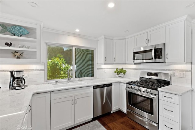 42244 Cosmic Dr, Temecula, CA 92592 - kitchen featuring stainless steel appliances, white cabinets, open shelves, decorative backsplash, and ornamental molding