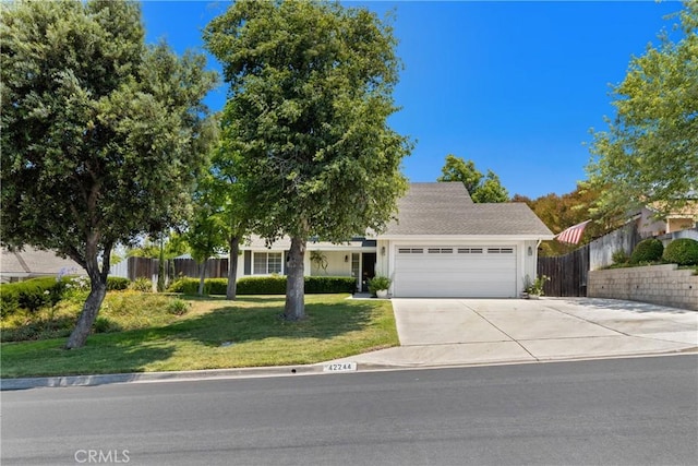 42244 Cosmic Dr, Temecula, CA 92592 - obstructed view of property featuring an attached garage and driveway