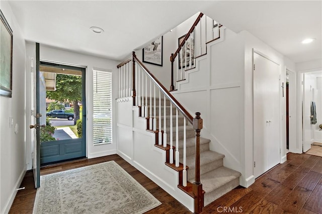 42244 Cosmic Dr, Temecula, CA 92592 - entrance foyer featuring dark wood-style floors, stairs, and recessed lighting