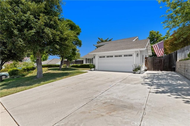 42244 Cosmic Dr, Temecula, CA 92592 - view of front of house featuring an attached garage and driveway