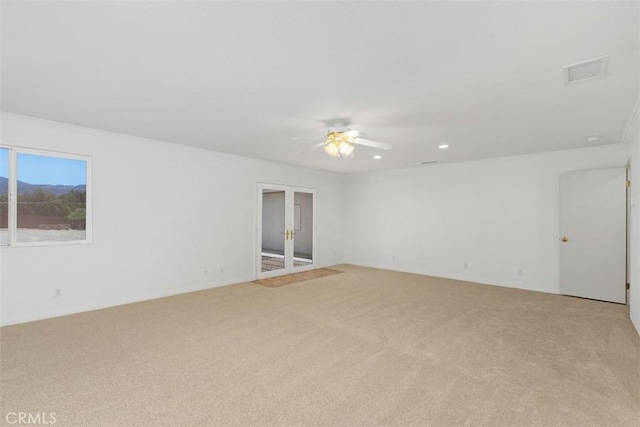 21285 Shoemaker Ln, Wildomar, CA 92595 - unfurnished room featuring light carpet, ceiling fan, recessed lighting, and french doors