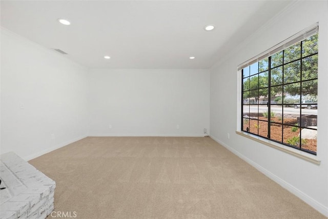 21285 Shoemaker Ln, Wildomar, CA 92595 - spare room featuring ornamental molding, recessed lighting, and light carpet