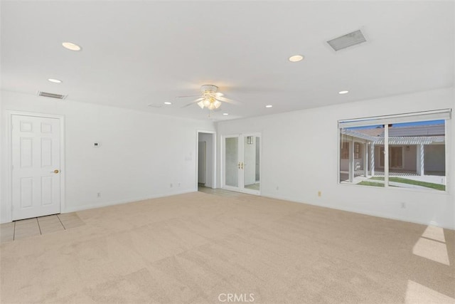 21285 Shoemaker Ln, Wildomar, CA 92595 - spare room featuring light colored carpet, recessed lighting, a ceiling fan, and french doors