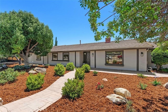 21285 Shoemaker Ln, Wildomar, CA 92595 - ranch-style house with a chimney and a tiled roof