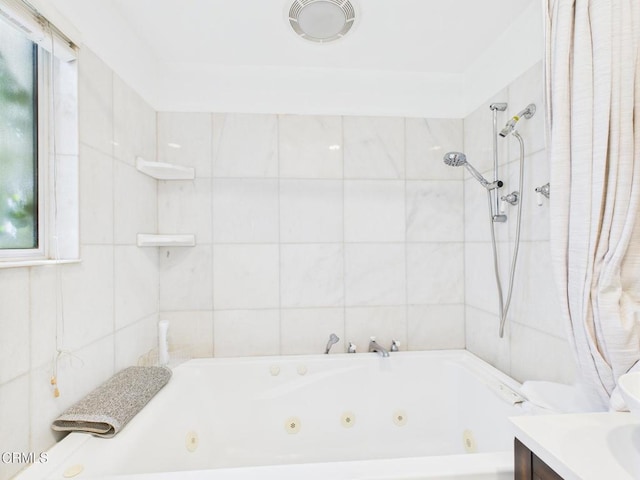 2025 N Chouteau St, Orange, CA 92865 - full bathroom featuring vanity, tile walls, and a combined bath / shower with jetted tub
