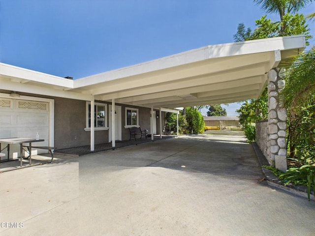 2025 N Chouteau St, Orange, CA 92865 - view of patio featuring driveway and a carport