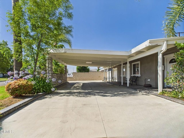 2025 N Chouteau St, Orange, CA 92865 - view of parking with driveway and an attached carport