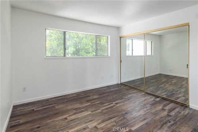 16755 Parthenia St Unit 5, Northridge, CA 91343 - unfurnished bedroom featuring wood finished floors and a closet
