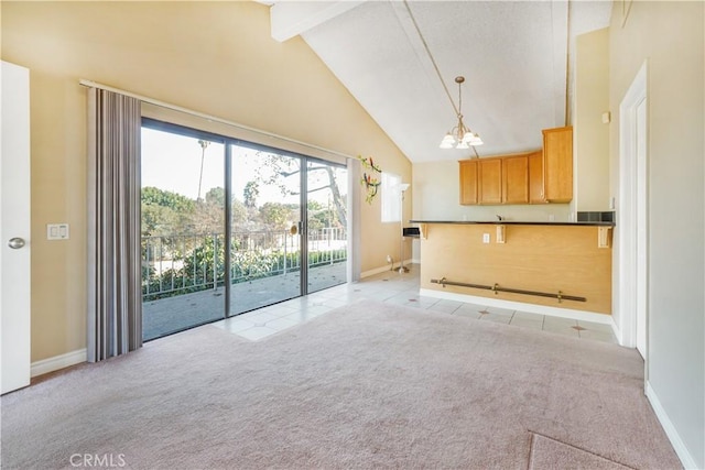 1129 Walnut Grove Ave, Rosemead, CA 91770 - unfurnished living room with beamed ceiling, light colored carpet, a chandelier, and high vaulted ceiling