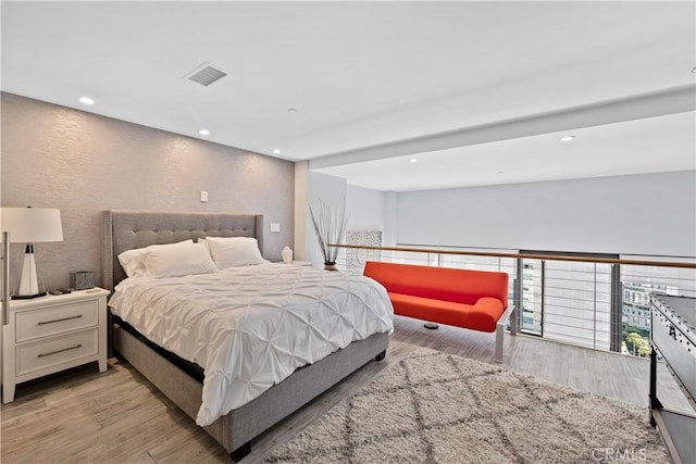 1100 Wilshire Blvd Unit 1707, Los Angeles, CA 90017 - bedroom featuring recessed lighting and light wood-style floors