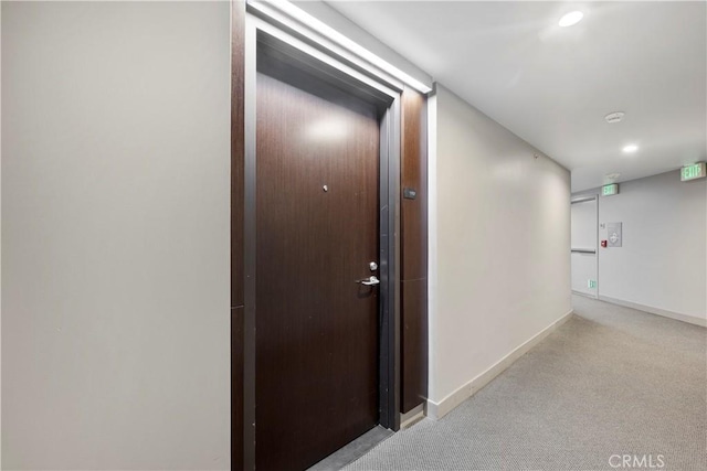 1100 Wilshire Blvd Unit 1707, Los Angeles, CA 90017 - corridor featuring carpet floors and recessed lighting