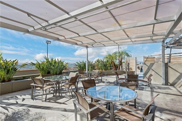 1100 Wilshire Blvd Unit 1707, Los Angeles, CA 90017 - view of patio / terrace with outdoor dining space and a pergola