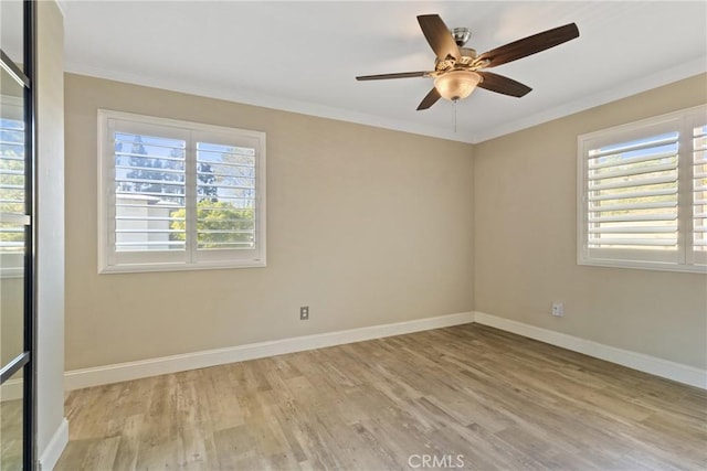 1710 S El Camino Real Unit E204, Encinitas, CA 92024 - empty room with wood finished floors, crown molding, and ceiling fan