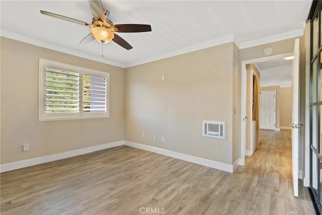 1710 S El Camino Real Unit E204, Encinitas, CA 92024 - spare room featuring ornamental molding, light wood-style floors, ceiling fan, and a smoke detector
