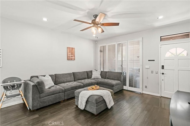 5722 E Stillwater Ave Unit 104, Orange, CA 92869 - living area featuring a ceiling fan, dark wood-type flooring, healthy amount of natural light, and recessed lighting