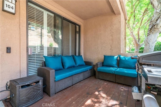 5722 E Stillwater Ave Unit 104, Orange, CA 92869 - view of patio / terrace with an outdoor hangout area and a wooden deck