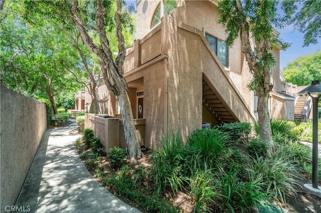5722 E Stillwater Ave Unit 104, Orange, CA 92869 - view of side of property with stucco siding