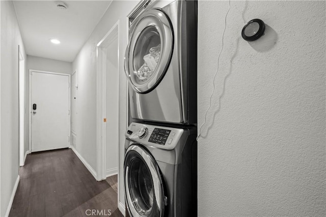 5722 E Stillwater Ave Unit 104, Orange, CA 92869 - laundry area with stacked washer / drying machine, dark wood-style flooring, and recessed lighting