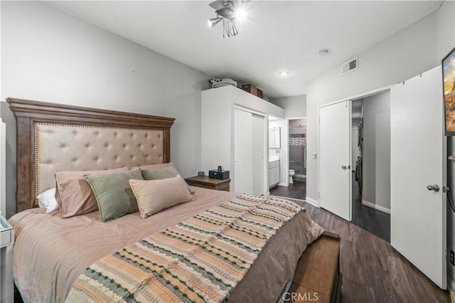 5722 E Stillwater Ave Unit 104, Orange, CA 92869 - bedroom with wood finished floors and ensuite bathroom