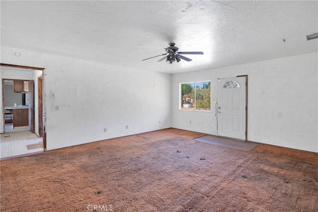 19215 Hupa Rd, Apple Valley, CA 92307 - carpeted empty room featuring a ceiling fan