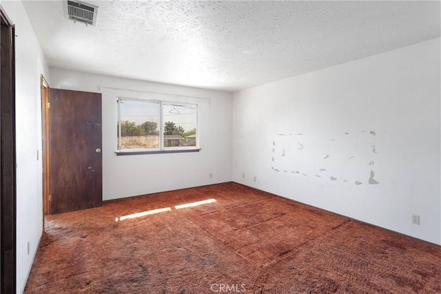 19215 Hupa Rd, Apple Valley, CA 92307 - spare room with carpet and a textured ceiling