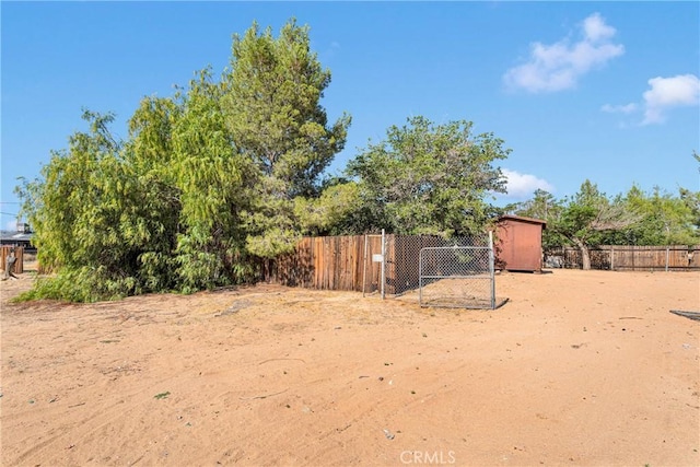 19215 Hupa Rd, Apple Valley, CA 92307 - fenced backyard with a storage unit