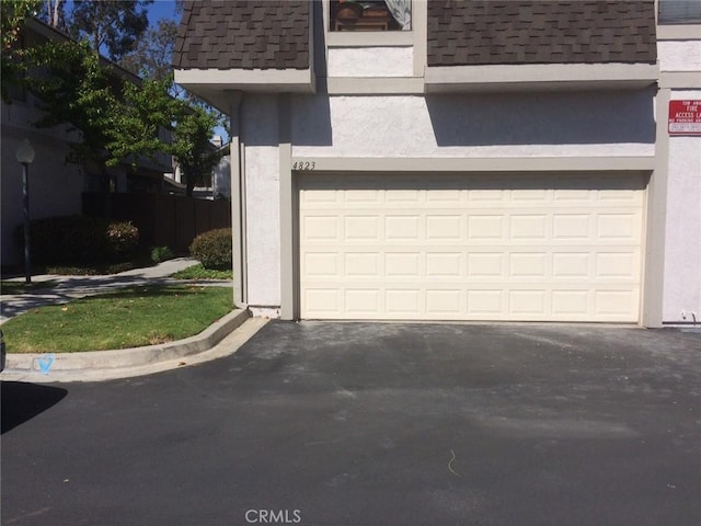 4823 Fieldbrook Ln Unit 24, Cypress, CA 90630 - garage featuring driveway