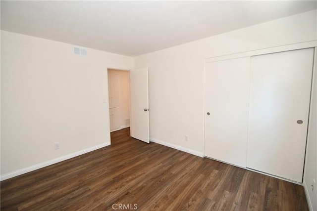23814 Walnut St, Torrance, CA 90501 - unfurnished bedroom with wood finished floors and a closet