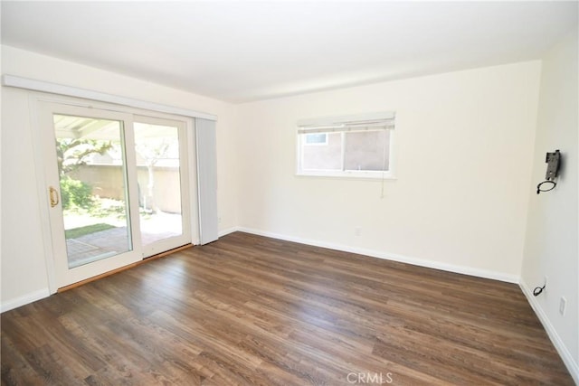 23814 Walnut St, Torrance, CA 90501 - spare room with plenty of natural light and dark wood finished floors