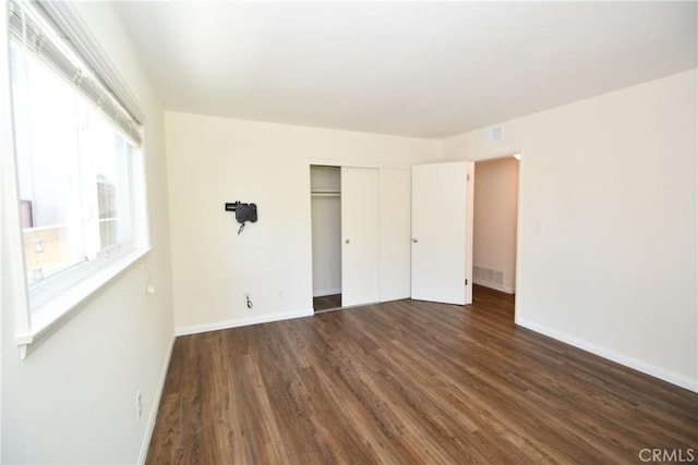 23814 Walnut St, Torrance, CA 90501 - unfurnished bedroom featuring dark wood-style floors and a closet