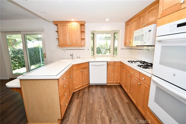 23814 Walnut St, Torrance, CA 90501 - kitchen with white appliances, open shelves, a peninsula, dark wood-style floors, and plenty of natural light