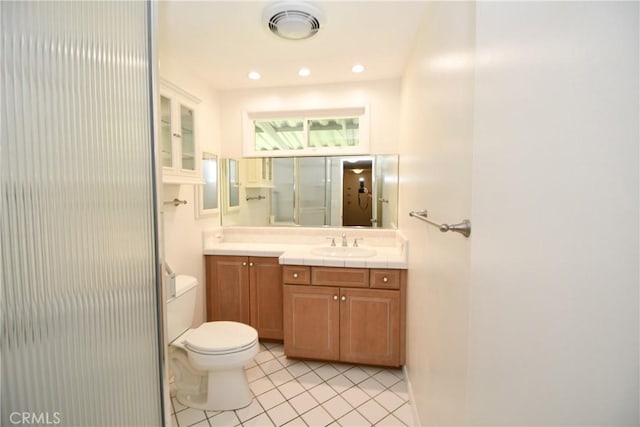 23814 Walnut St, Torrance, CA 90501 - full bath featuring tile patterned floors, vanity, a shower with door, and recessed lighting