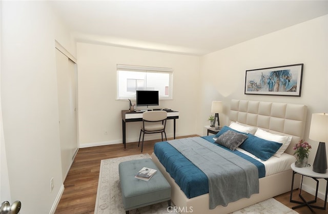 23814 Walnut St, Torrance, CA 90501 - bedroom with wood finished floors and baseboards
