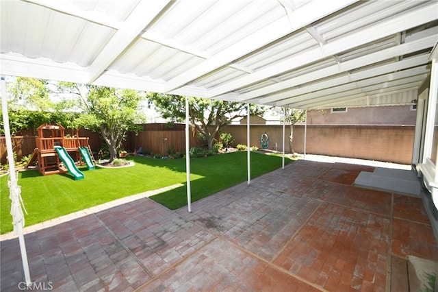 23814 Walnut St, Torrance, CA 90501 - fenced backyard featuring a patio area and a playground