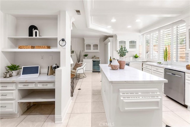 29813 Via Sevilla, Temecula, CA 92591 - kitchen featuring stainless steel dishwasher, beverage cooler, a center island, white cabinets, and ornamental molding