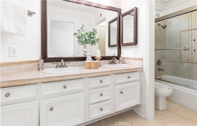 29813 Via Sevilla, Temecula, CA 92591 - full bathroom with double vanity, crown molding, enclosed tub / shower combo, and tile patterned floors
