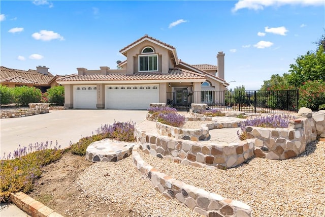 29813 Via Sevilla, Temecula, CA 92591 - view of front of home featuring stucco siding, a tile roof, driveway, and an attached garage