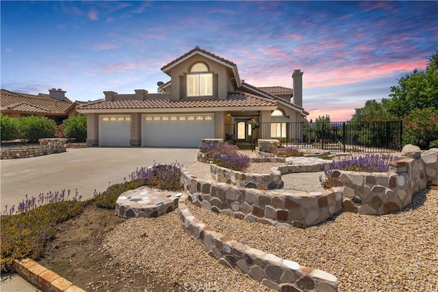 29813 Via Sevilla, Temecula, CA 92591 - view of front facade featuring a tile roof, stucco siding, concrete driveway, a chimney, and an attached garage