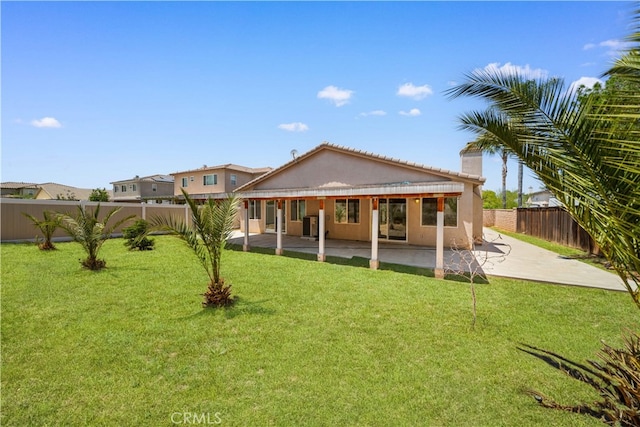 28677 Sunridge Ct, Menifee, CA 92584 - back of property featuring a patio, a fenced backyard, a chimney, and stucco siding