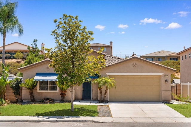28677 Sunridge Ct, Menifee, CA 92584 - view of front of house featuring a garage, concrete driveway, stucco siding, and a tiled roof